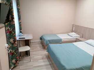 Отель Vega Архангельск Cемейный номер с собственной ванной комнатой-1