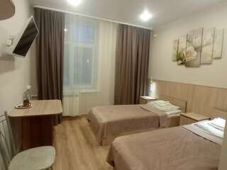 Отель Vega Архангельск Двухместный номер с 2 отдельными кроватями-10