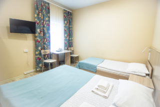 Отель Vega Архангельск Номер стандарт с 1 двуспальной кроватью и 1 односпальной кроватью (3 этаж)-1