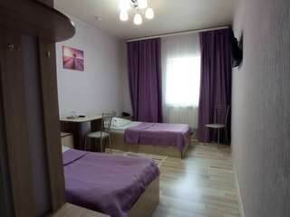 Отель Vega Архангельск Двухместный номер с 2 отдельными кроватями-1