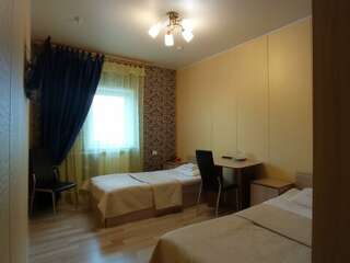 Отель Vega Архангельск Двухместный номер с 2 отдельными кроватями-3